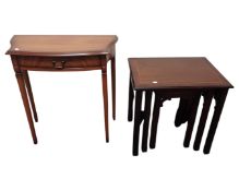 A nest of mahogany tables together with a side table fitted a drawer