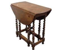An oak gateleg table