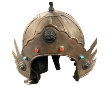 An early 20th century oriental helmet.