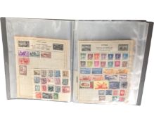 A folio containing a large selection of old stamps, franked & unfranked,
