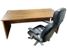 A contemporary walnut effect computer desk (width 180cm), together with a leather swivel chair.