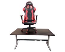 A stained ash computer table together with a swivel chair.