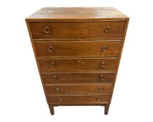 A Scandinavian walnut six drawer chest.