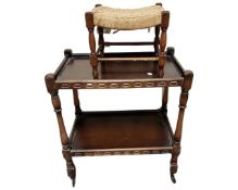 An oak two tier trolley on castors together with a rattan stool.