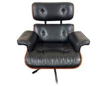 A chrome beech and black leather armchair in the manner of Charles and Ray Eames.