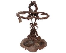 A cast metal stick stand,