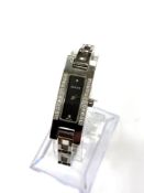 A lady's Gucci diamond watch set with 24 diamonds