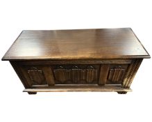 An oak linenfold blanket chest.