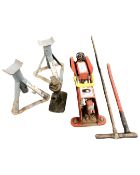 A box of tools including car jack