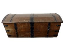 A 19th century Continental oak dome topped blanket chest with wrought iron fittings.