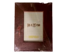 One crate containing nineteen Xenos dark wood 10 cm x 15 cm photo frames,