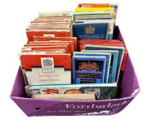 A box containing a large quantity of Ordnance Survey maps.