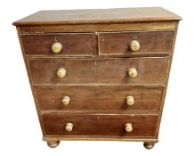 A Victorian stained pine chest of five drawers,