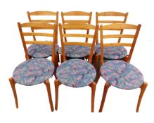 A set of six Scandinavian ladder backed chairs.