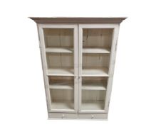 A painted pine double door cabinet.