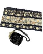 A crewelwork shawl together with a brass mounted silk handbag.