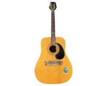 A 20th century acoustic guitar.