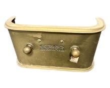 A Victorian brass fire guard.