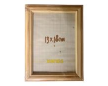 One crate containing nineteen Xenos 13 cm x 18 cm pine photo frames,