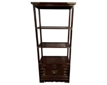 A Chinese elm and brass mounted etagère.