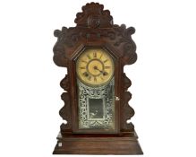 A 19th century American gingerbread clock.