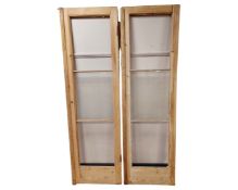 A pair of rustic pine doors.