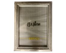 One crate containing nineteen Xenos silver finish 13 cm x 18 cm photo frames,
