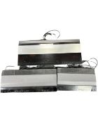 A Bang & Olufsen Beocentre 2200 together with a Beogram CD 3500 and a Beomaster 3500.