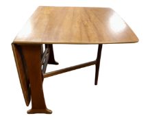 A 20th century teak gateleg table