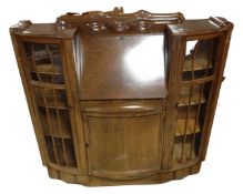 A 20th century oak side by side bureau bookcase