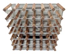 A metal and pine 36 bottle wine rack