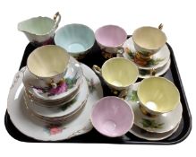 A Paragon 21 piece Six World Famous Roses bone china tea set.