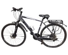 A gent's Giant Aluxx Technology 27-gear front suspension hybrid bike with rear pannier rack.