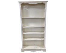 A set of painted pine open shelves