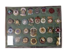 A collection of bowling club enamelled badges.