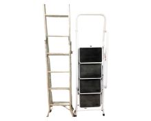 A set of aluminium multifunction steps together with a four-tread folding step ladder with hand