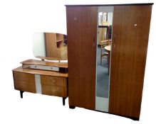 A mid century LImelight Furniture double door wardrobe and two-tone four drawer dressing table