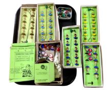 A tray containing Subbuteo teams including Brazil and Spain together with a match score recorder