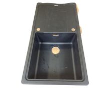 A Franke composite sink with drainer, black, boxed.