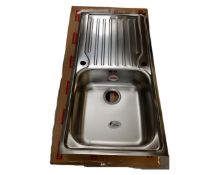 A Franke stainless steel sink with drainer, boxed.