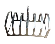 A silver six slice toast rack, London hallmarks (84.