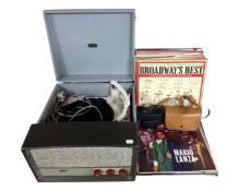 A mid-20th century EMI tabletop portable record player together with a quantity of LPs and two