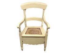 A painted Edwardian commode armchair