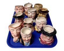 A tray containing 11 Avon Ware Dickens character jugs.