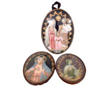 An antiquarian religious cloth relief panel depicting Mary,