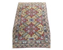 A Caucasian design rug,