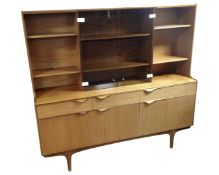 A 20th century S Form teak sideboard