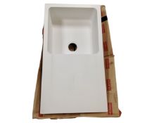 A Franke composite sink with drainer, white, boxed.