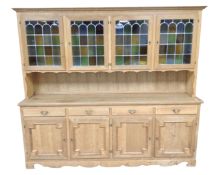 A Scandinavian blonde oak four door,