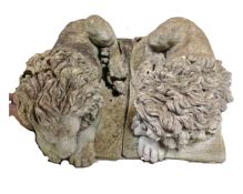 A pair of concrete garden figures - Lions